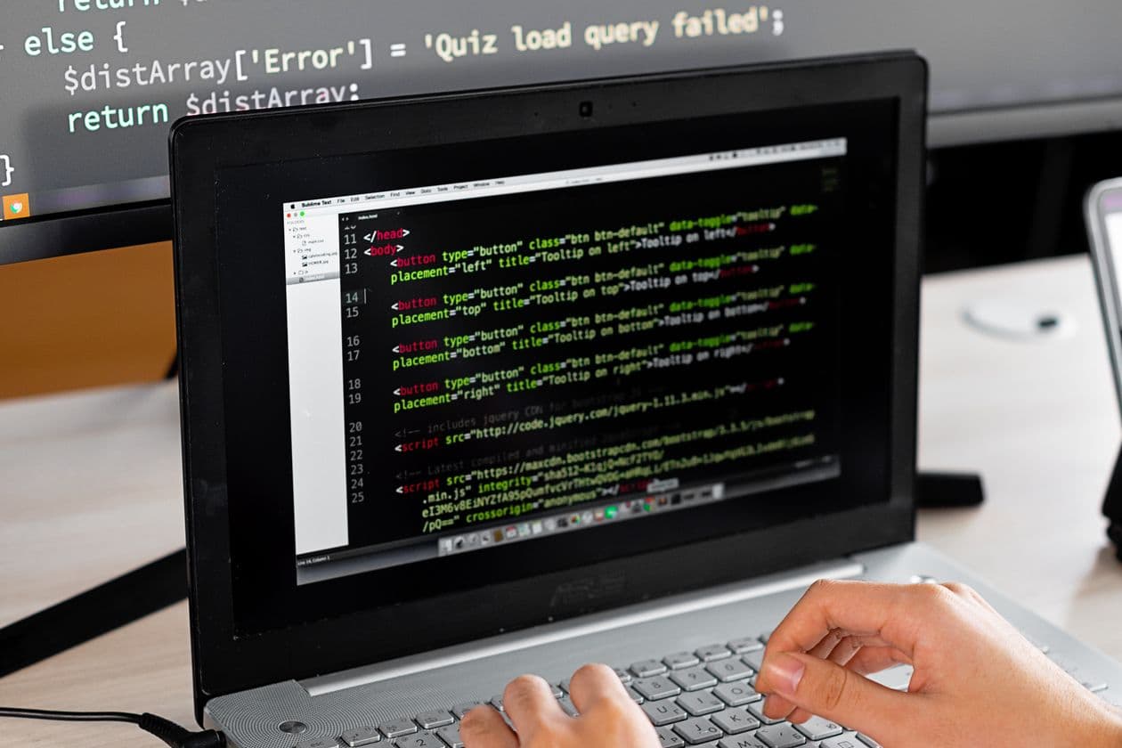 Laptop showing code with an error-handling branch